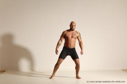 Underwear Gymnastic poses Man Black Muscular Bald Dancing Dynamic poses Academic